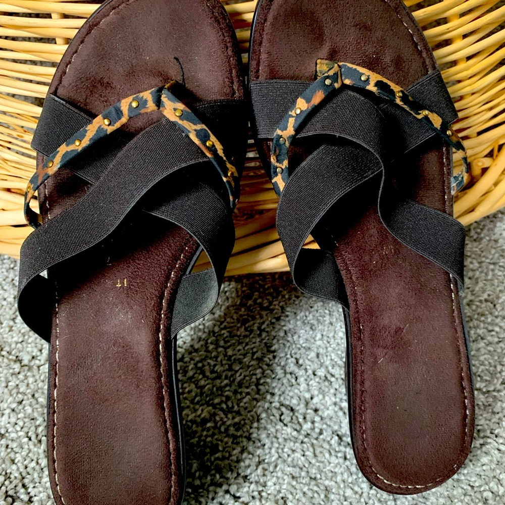 Women’s brown and black beaded strapped wedged sandals.